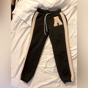 Girls black with pink detail sweatpants.